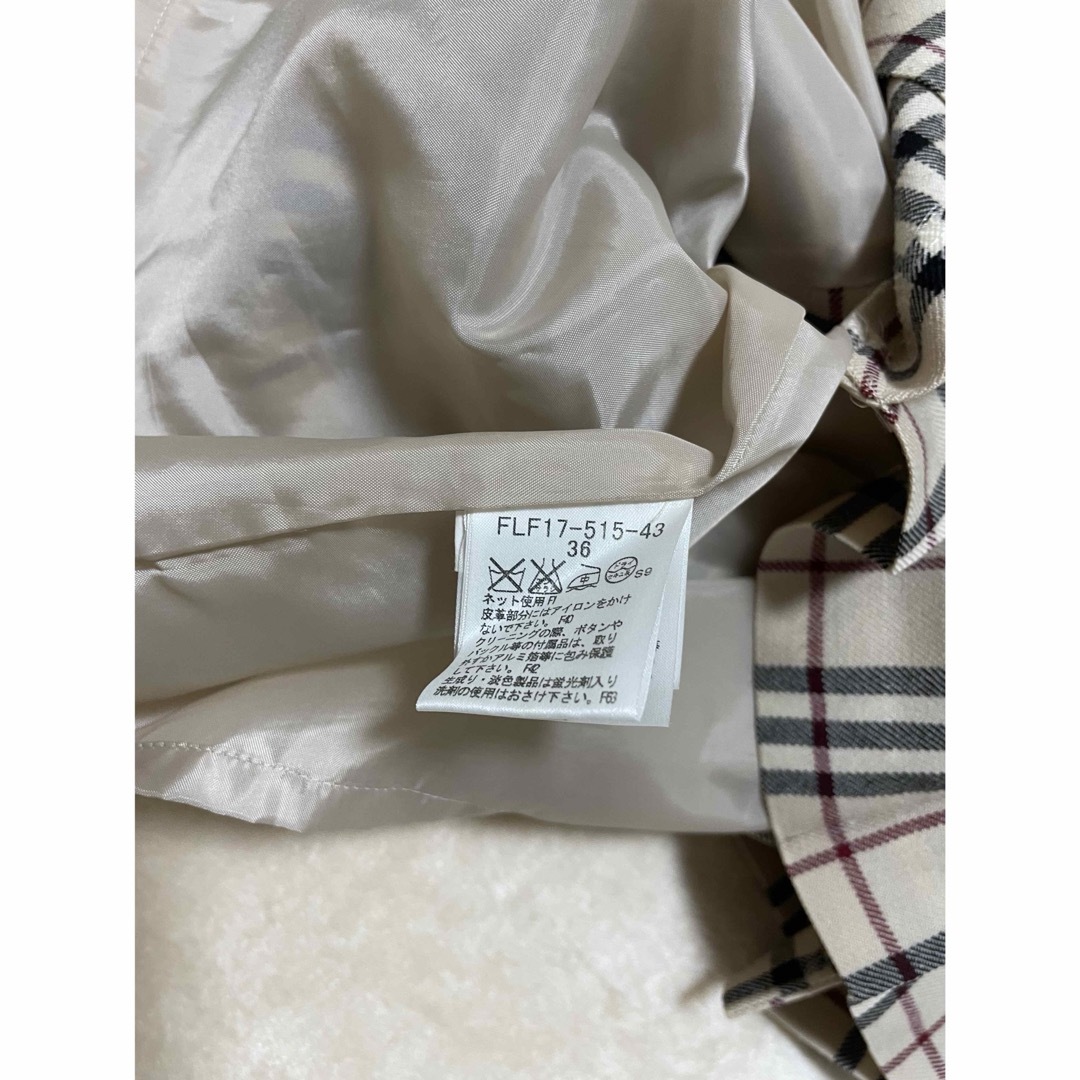 BURBERRY(バーバリー)のBurberry ノバ チェックベルト付き フリンジ 巻きスカート 38 レディースのスカート(ミニスカート)の商品写真