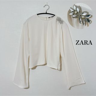 ザラ(ZARA)の極美品◆ ZARA ビジュー 花 長袖 フレア袖 トップス ホワイト 高級感 L(シャツ/ブラウス(長袖/七分))