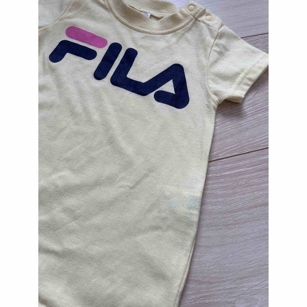 FILA(フィラ)の80センチ　FILA フィラ 半袖ロンパース　イエロー　黄色 キッズ/ベビー/マタニティのベビー服(~85cm)(ロンパース)の商品写真