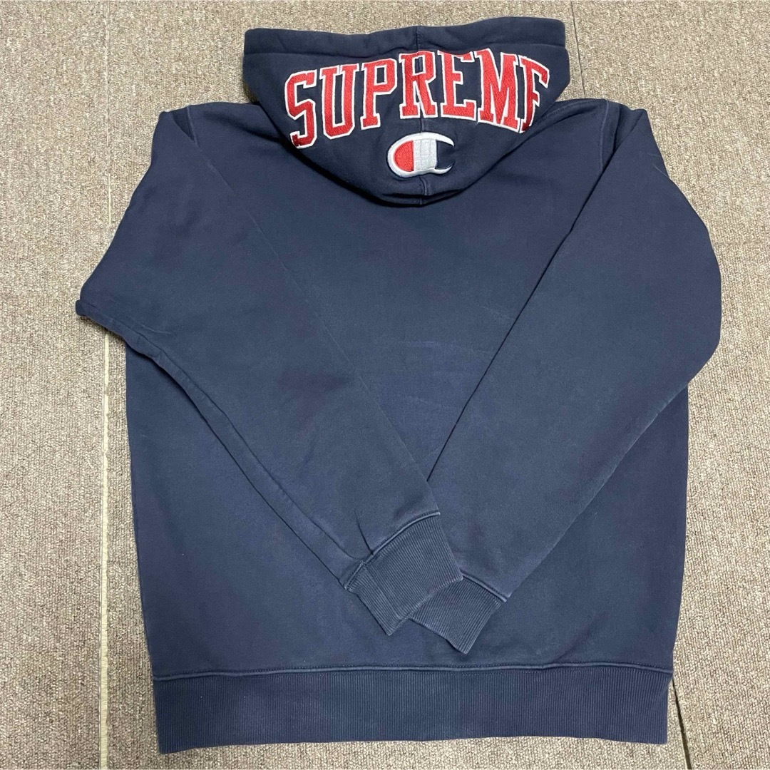 Supreme(シュプリーム)のSUPREME × Champion Arc Logo Zip Up Sweat メンズのトップス(パーカー)の商品写真