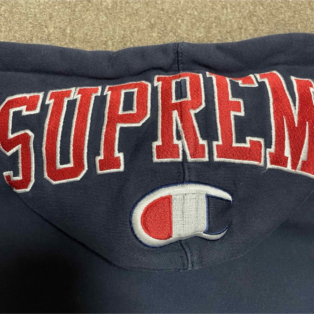 Supreme(シュプリーム)のSUPREME × Champion Arc Logo Zip Up Sweat メンズのトップス(パーカー)の商品写真