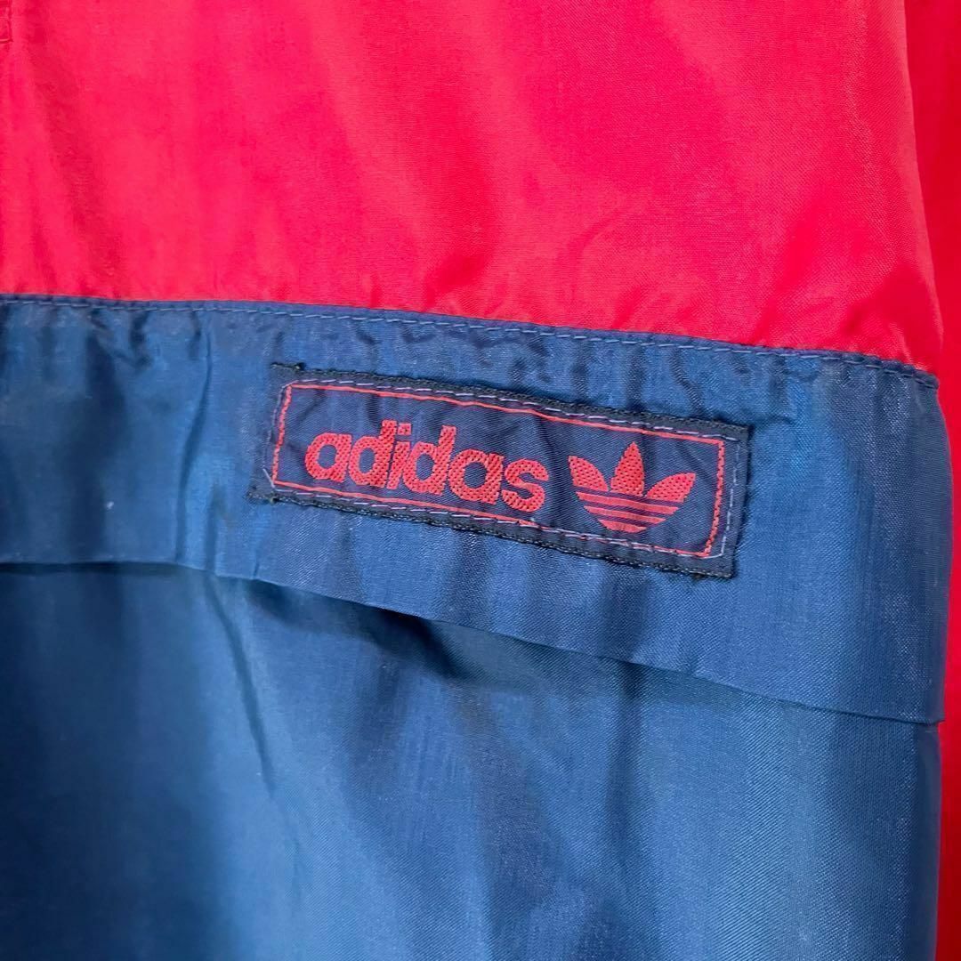 adidas(アディダス)のアディダス ナイロンジャケット 80s 古着 XL トレフォイル 無地 赤a61 メンズのジャケット/アウター(ナイロンジャケット)の商品写真