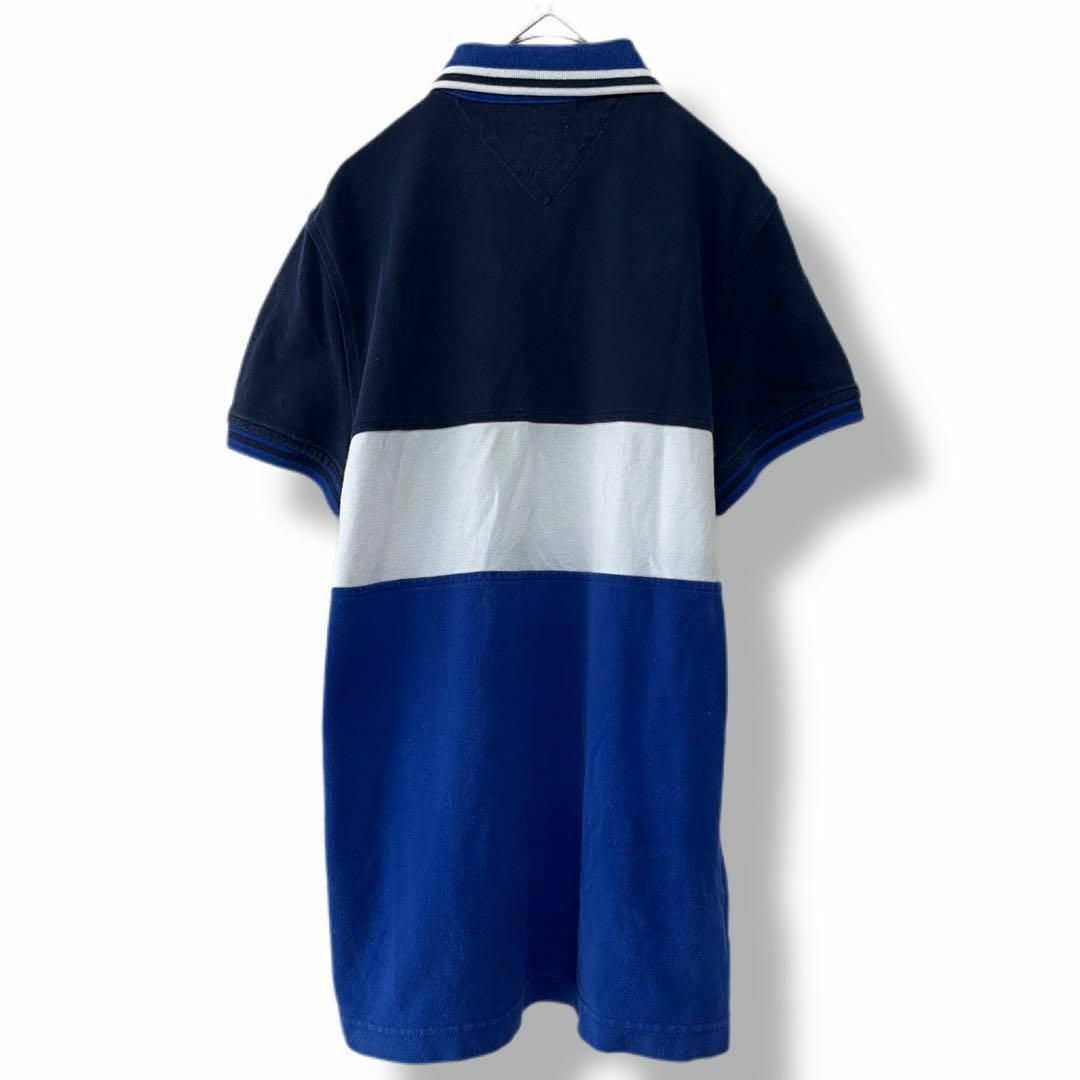 TOMMY HILFIGER(トミーヒルフィガー)のトミーヒルフィガー ポロシャツ 古着 XS ロゴ ワッペン 青白ネイビーb34 メンズのトップス(ポロシャツ)の商品写真