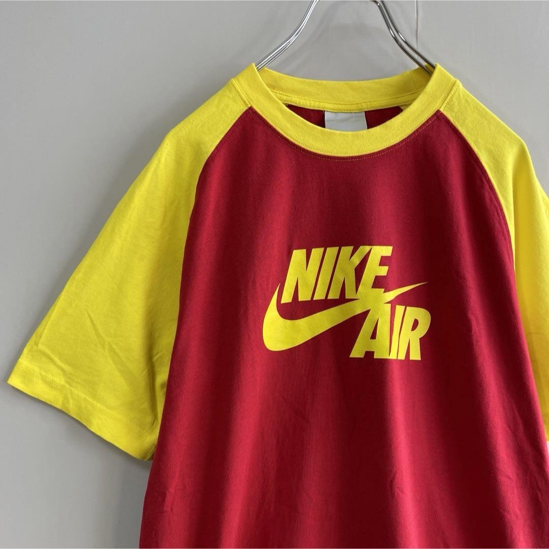 NIKE(ナイキ)の【ラグラン、リンガーTシャツ】NIKEビッグスウッシュロゴ古着ストリート赤黄M メンズのトップス(Tシャツ/カットソー(半袖/袖なし))の商品写真