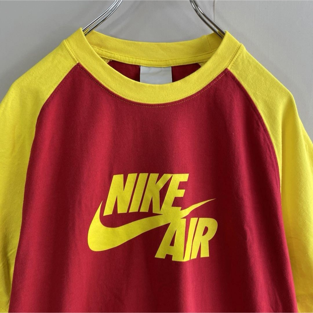 NIKE(ナイキ)の【ラグラン、リンガーTシャツ】NIKEビッグスウッシュロゴ古着ストリート赤黄M メンズのトップス(Tシャツ/カットソー(半袖/袖なし))の商品写真