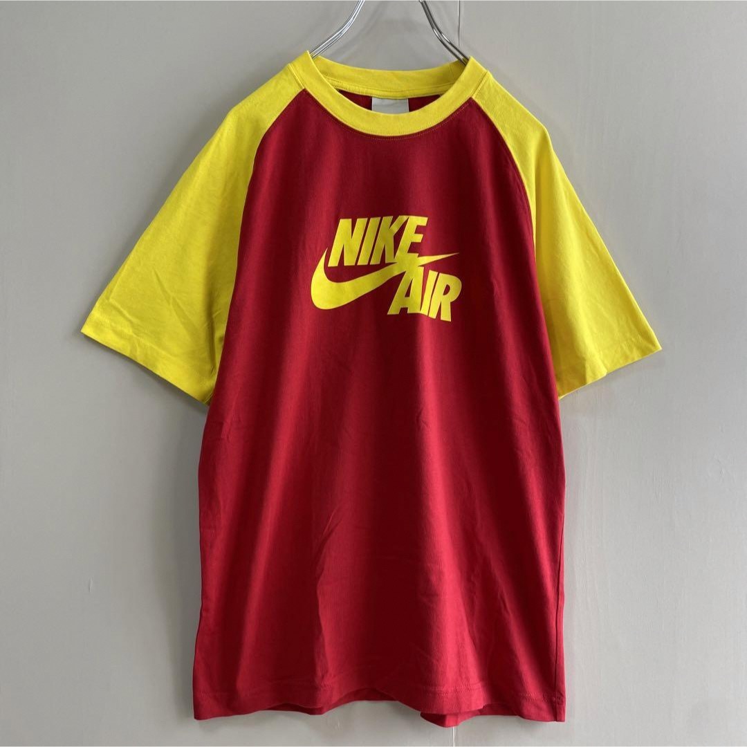 NIKE(ナイキ)の【ラグラン、リンガーTシャツ】NIKEビッグスウッシュロゴ古着ストリート赤黄M メンズのトップス(Tシャツ/カットソー(半袖/袖なし))の商品写真