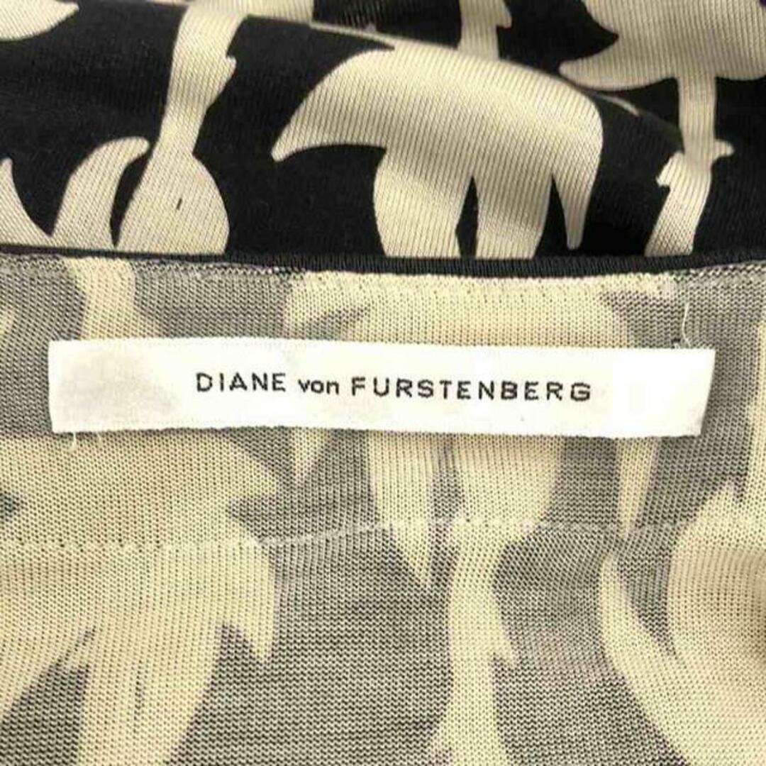 DIANE von FURSTENBERG(ダイアンフォンファステンバーグ)のDIANE VON FURSTENBERG / ダイアンフォンファステンバーグ | シルク 総柄 カシュクールワンピース | 4 | ホワイト / ブラック | レディース レディースのワンピース(ひざ丈ワンピース)の商品写真