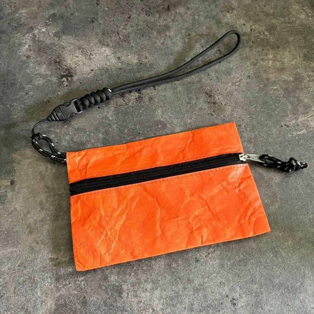 ポーチ　小物入れ　タイベック　ストラップ付き　超軽量　キャンプ　登山　オレンジ レディースのファッション小物(ポーチ)の商品写真
