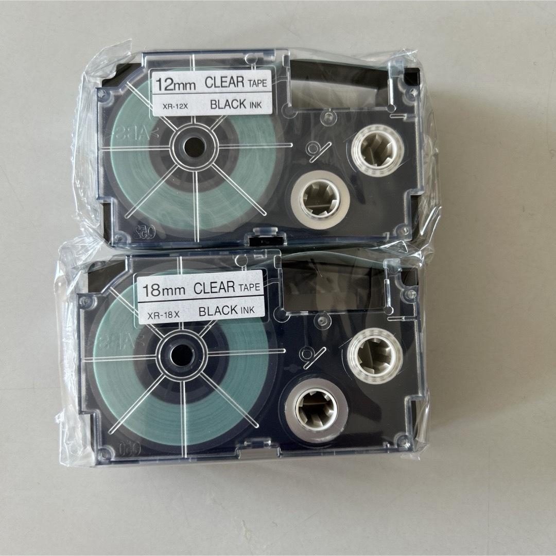 カシオネームランド テープカートリッジ 12mm18mm透明黒文字 インテリア/住まい/日用品の文房具(テープ/マスキングテープ)の商品写真