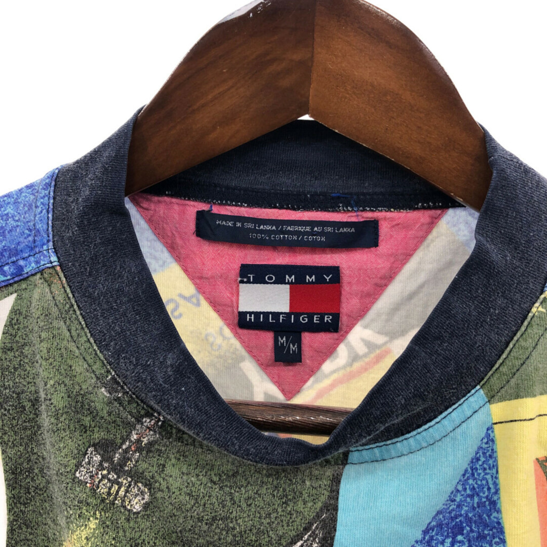 TOMMY HILFIGER(トミーヒルフィガー)の90年代 TOMMY HILFIGER トミーヒルフィガー 半袖Ｔシャツ 総柄 ブルー (メンズ M) 中古 古着 Q6607 メンズのトップス(Tシャツ/カットソー(半袖/袖なし))の商品写真