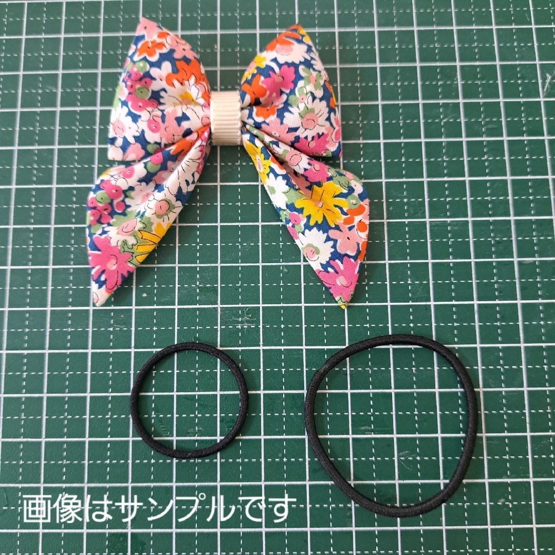 19　リボンヘアゴム　ベビー　キッズ ハンドメイドのキッズ/ベビー(ファッション雑貨)の商品写真