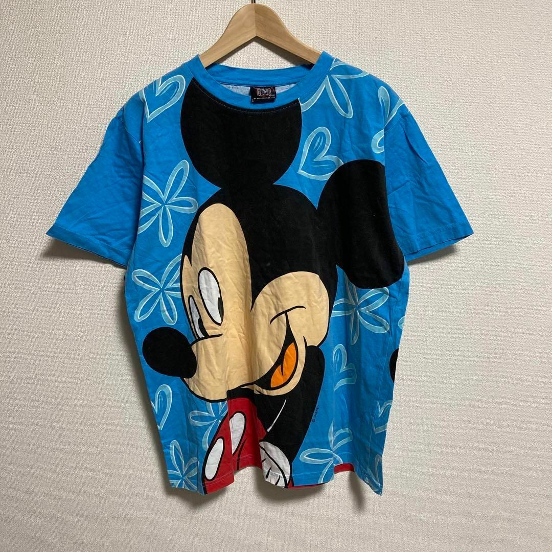 Disney(ディズニー)のDisney ディズニー　Tシャツ ミッキー　両面プリント　ブルー　XL メンズのトップス(Tシャツ/カットソー(半袖/袖なし))の商品写真