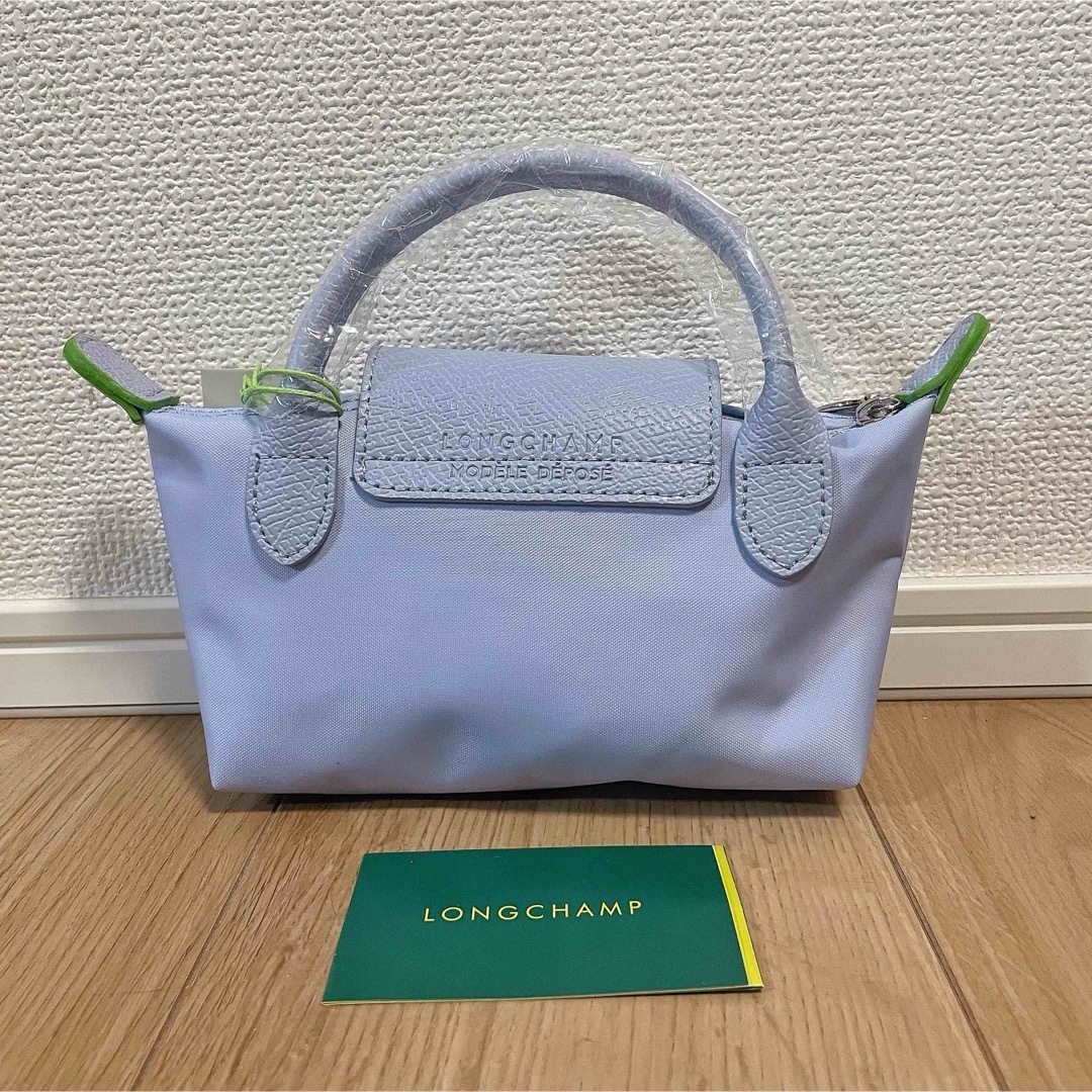 LONGCHAMP(ロンシャン)の新品未使用　longchamp ロンシャン ハンドル付きポーチ　スカイブルー レディースのバッグ(ハンドバッグ)の商品写真