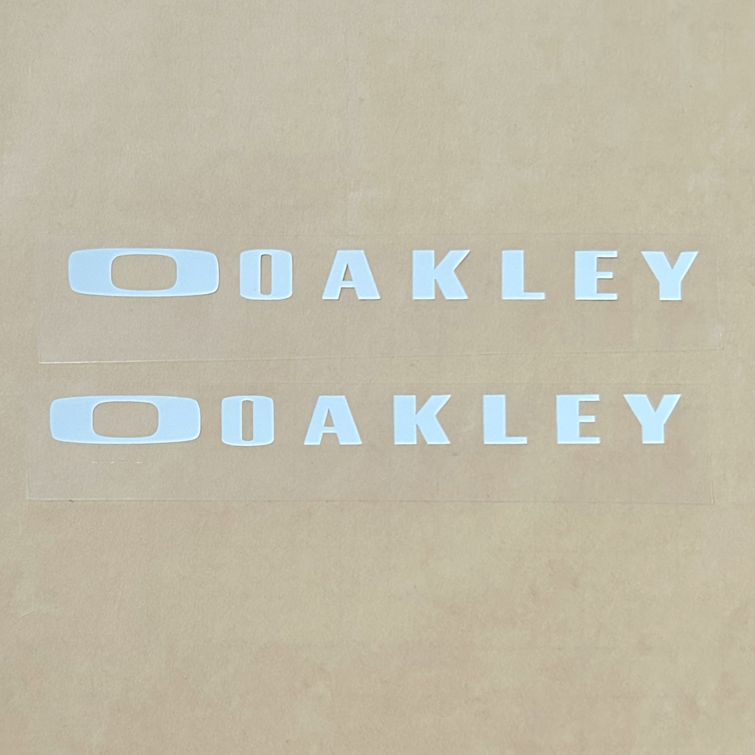 Oakley(オークリー)のOAKLEY オークリー カッティングステッカー◆白グロス◆2点◆ スポーツ/アウトドアのスポーツ/アウトドア その他(サーフィン)の商品写真