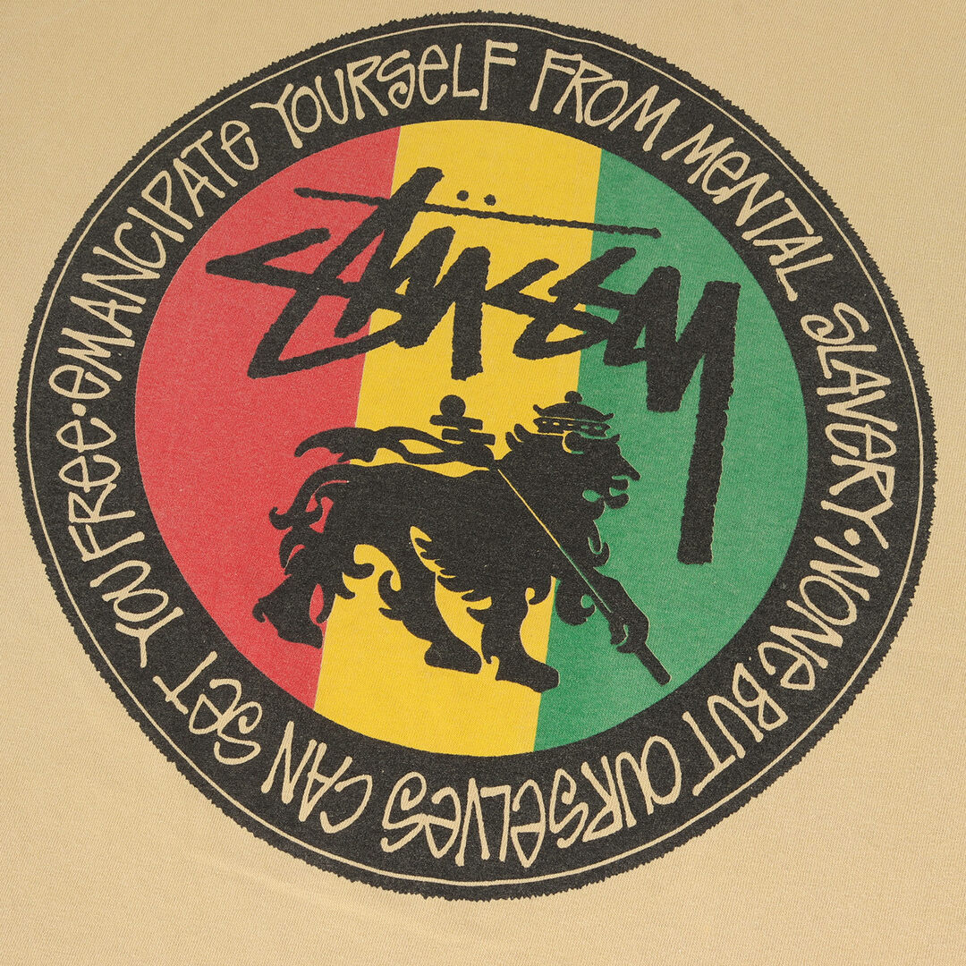 STUSSY(ステューシー)のSTUSSY ステューシー Tシャツ サイズ:M 80s OLD STUSSY 黒タグ FeeLIN IRIe ラスタライオン クルーネック 半袖Tシャツ USA製 ベージュ 80年代 ヴィンテージ 古着 トップス カットソー【メンズ】【中古】 メンズのトップス(Tシャツ/カットソー(半袖/袖なし))の商品写真