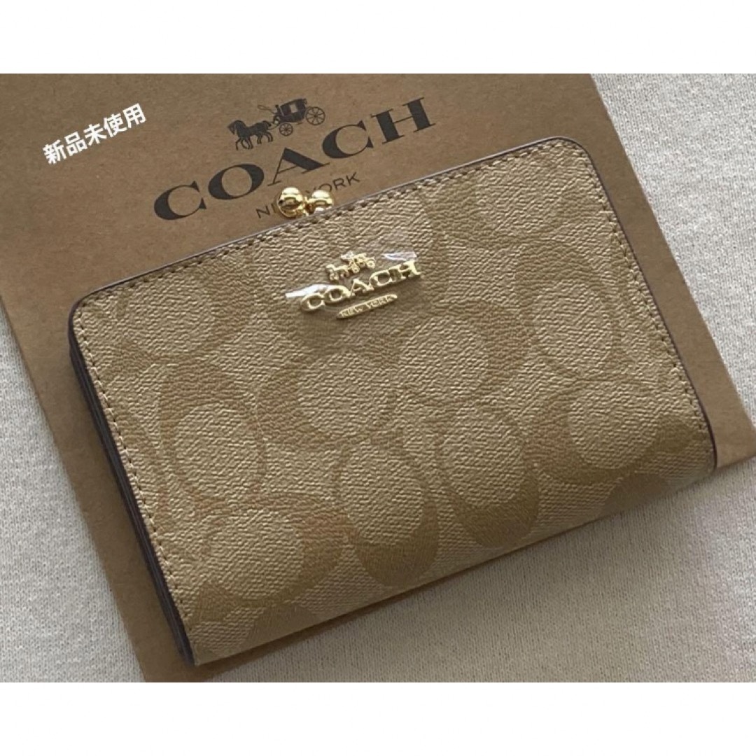 COACH(コーチ)の新品　COACH コーチ　二つ折り財布　シグネチャー　がま口　キスロック レディースのファッション小物(財布)の商品写真