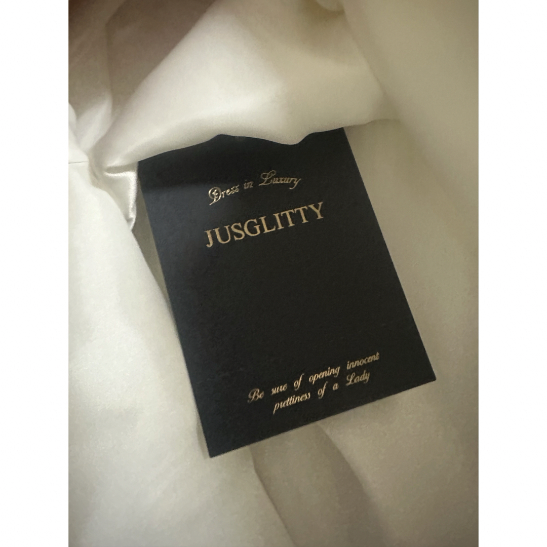 JUSGLITTY(ジャスグリッティー)の新品タグ付　ジャスグリッティー　スカート　白 レディースのスカート(その他)の商品写真