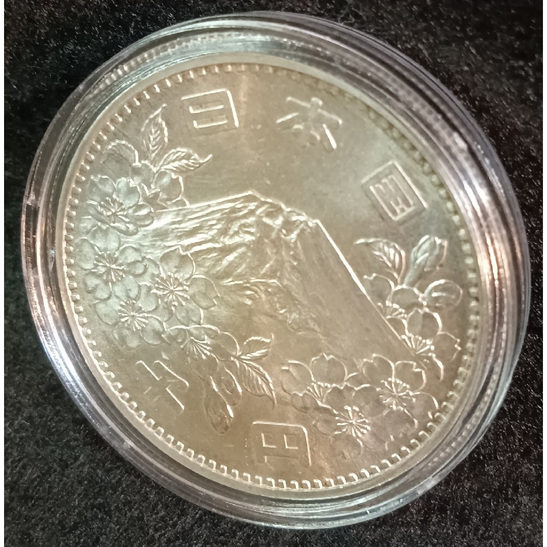 銀貨　東京オリンピック1.000円銀貨　silver925カプセルホルダー　綺麗 エンタメ/ホビーの美術品/アンティーク(金属工芸)の商品写真