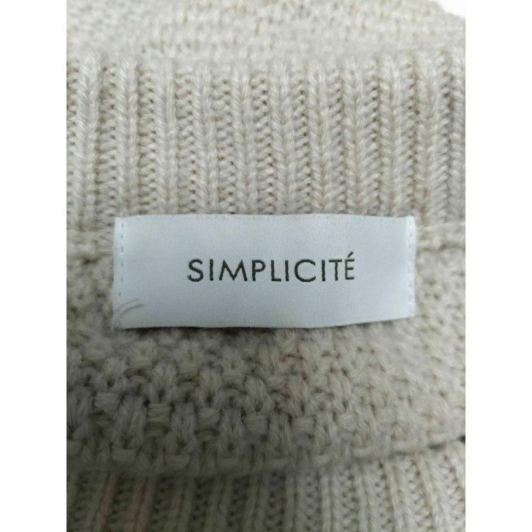 Simplicite(シンプリシテェ)のSIMPLICITE シンプルシテェ ケーブルニット ワンピース ベージュ レディースのワンピース(ひざ丈ワンピース)の商品写真