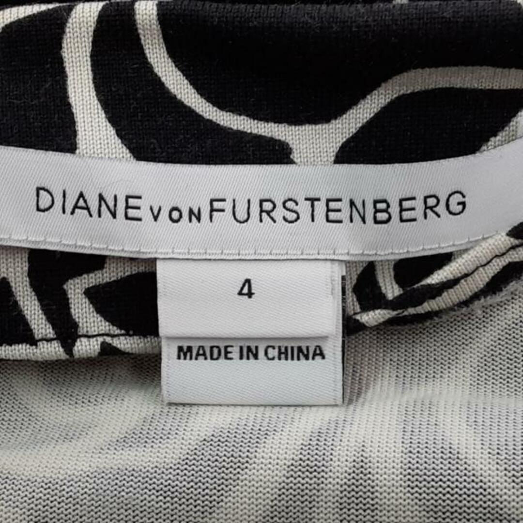 DIANE von FURSTENBERG(ダイアンフォンファステンバーグ)のDIANE VON FURSTENBERG(DVF)(ダイアン・フォン・ファステンバーグ) ワンピース サイズ4 S レディース - 黒×白 七分袖/ひざ丈/シルク/花柄/カシュクール レディースのワンピース(その他)の商品写真