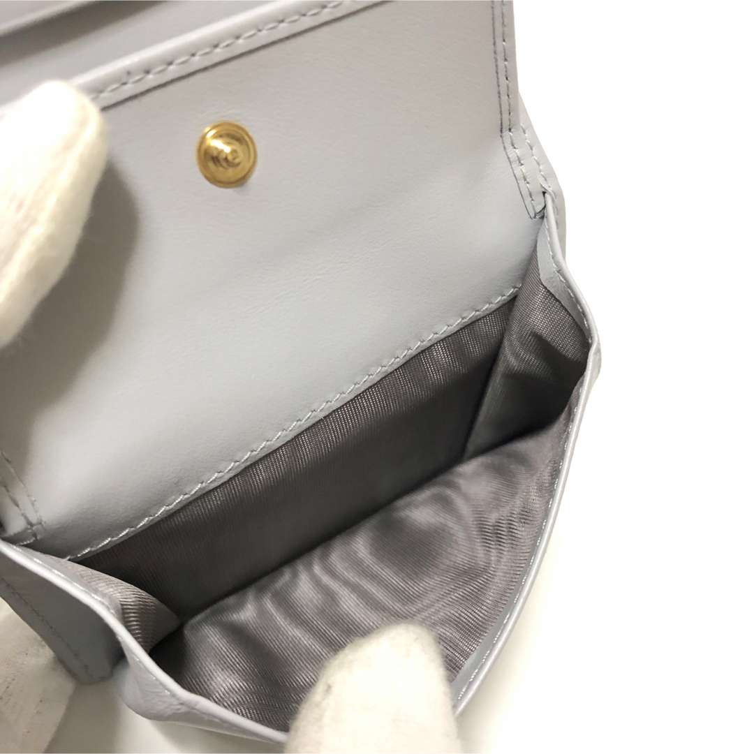 miumiu(ミュウミュウ)の【新品未使用品】【新型】MIUMIU ミュウミュウ　二つ折り財布　リボン　水色 レディースのファッション小物(財布)の商品写真
