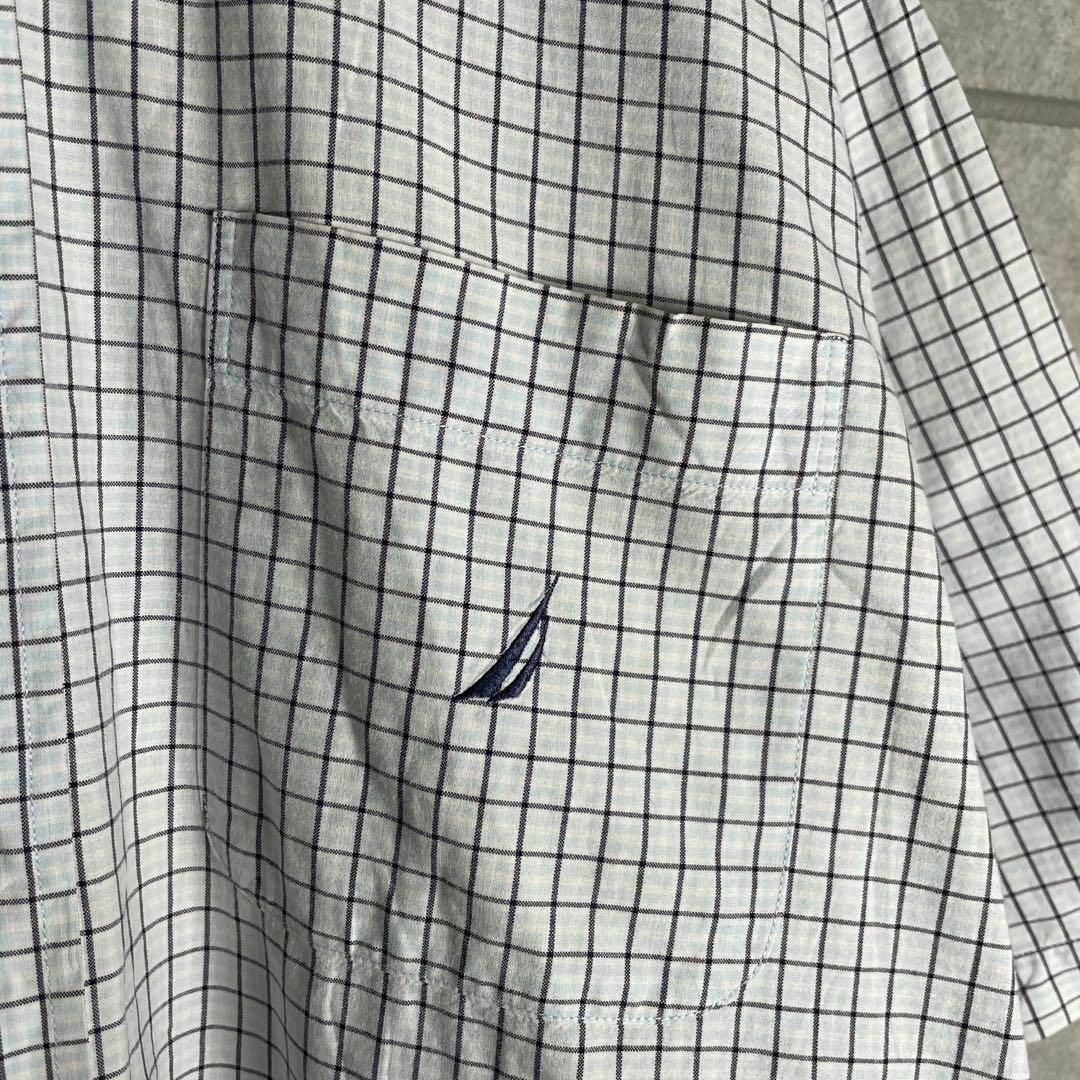 NAUTICA(ノーティカ)の[古着]ノーティカ　半袖　BDシャツ　ワンポイント刺繍　チェック　白　水色 メンズのトップス(シャツ)の商品写真