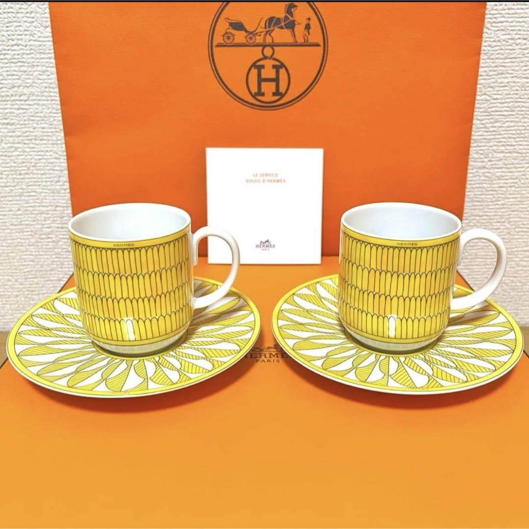 Hermes(エルメス)の【新品 ギフト包装】エルメス　ソレイユ　コーヒーカップ＆ソーサー　2客セット インテリア/住まい/日用品のキッチン/食器(グラス/カップ)の商品写真