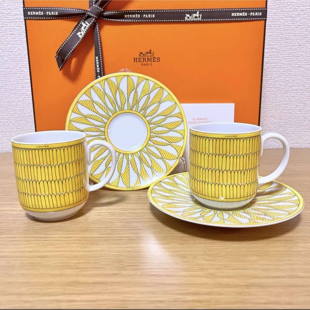 Hermes(エルメス)の【新品 ギフト包装】エルメス　ソレイユ　コーヒーカップ＆ソーサー　2客セット インテリア/住まい/日用品のキッチン/食器(グラス/カップ)の商品写真