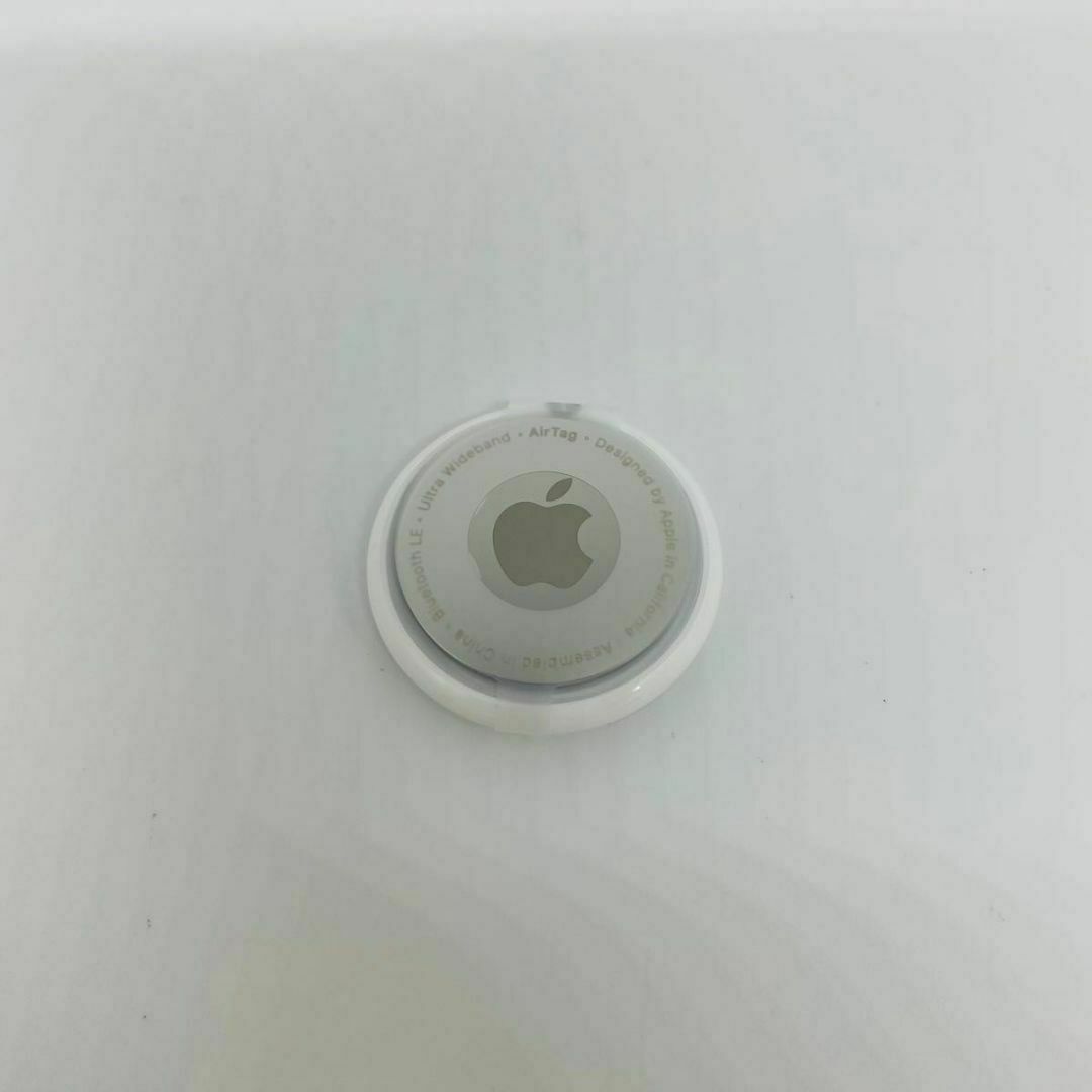 Apple(アップル)の新品 未使用 Air Tag エアタグ 　本体のみ 外箱なし保護フィルム付き スマホ/家電/カメラのスマホアクセサリー(その他)の商品写真