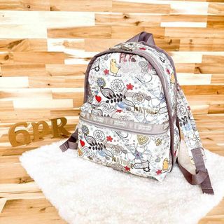 レスポートサック(LeSportsac)の【レスポートサック】鳥 花柄 ボタニカル×ペイズリー総柄 リュック 白×カラフル(リュック/バックパック)