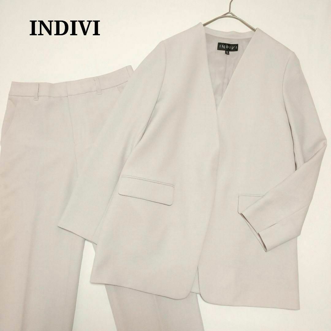 INDIVI(インディヴィ)のインディヴィ セットアップ アイボリー ノーカラージャケット36 パンツ34 レディースのフォーマル/ドレス(スーツ)の商品写真