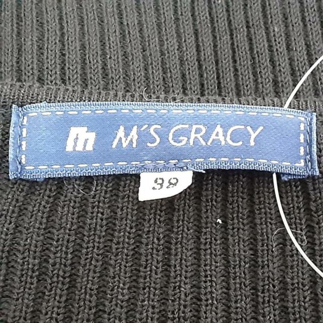 M'S GRACY(エムズグレイシー)のM'S GRACY(エムズグレイシー) カーディガン サイズ38 M レディース美品  - 黒 長袖/ジップアップ/パール/リボン レディースのトップス(カーディガン)の商品写真