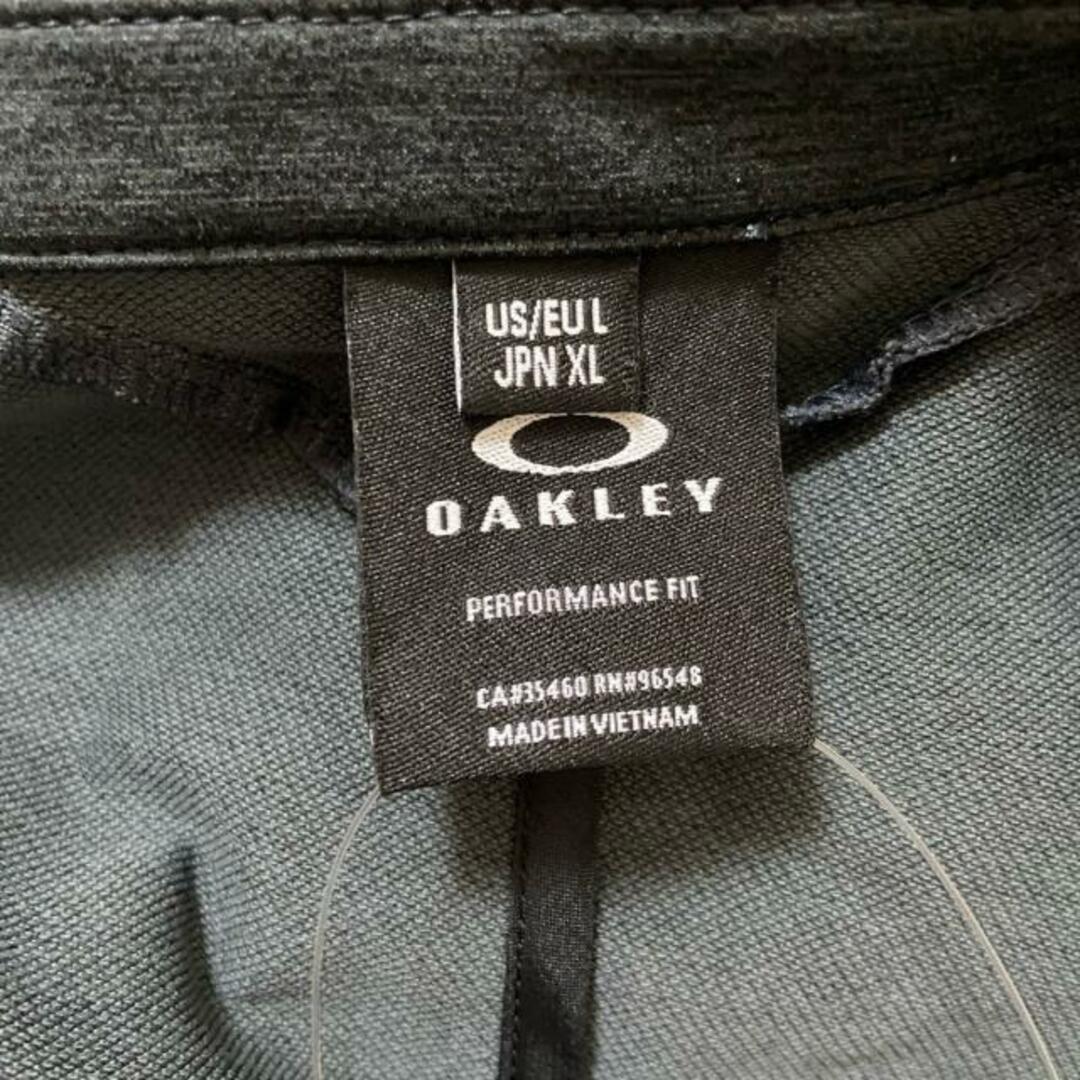 Oakley(オークリー)のOAKLEY(オークリー) ジャケット サイズXL美品  - ダークグレー レディースのジャケット/アウター(その他)の商品写真