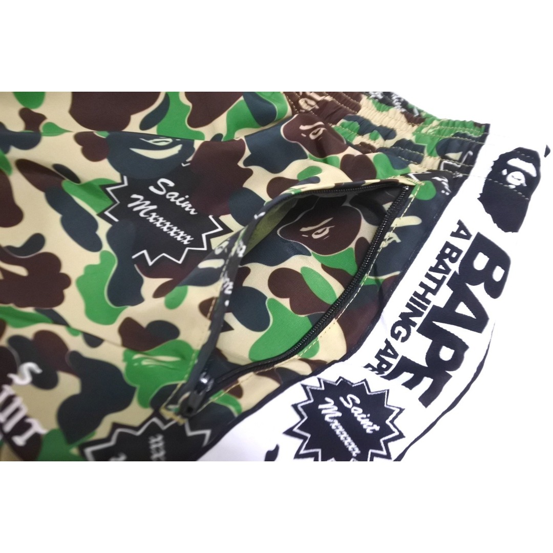 A BATHING APE(アベイシングエイプ)の新品未使用 SAINT MICHAEL BAPE セントマイケル アベイシングエイプ トラックパンツ SM-YS8-0000-C30 24SS グリーン サイズXL 63009 メンズのパンツ(ワークパンツ/カーゴパンツ)の商品写真