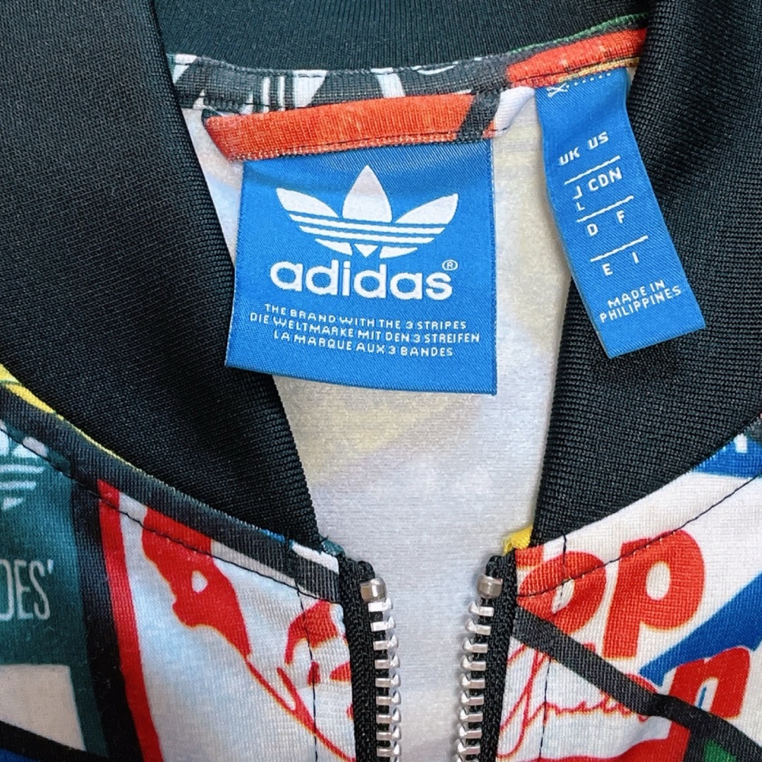 adidas(アディダス)のアディダス スタンスミス ロゴいっぱい トラックトップ ブルゾン ジャージ L メンズのトップス(ジャージ)の商品写真