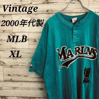 【k4015】USA古着MLBマーリンズプリントヘンリーネック半袖TシャツXL(Tシャツ/カットソー(半袖/袖なし))