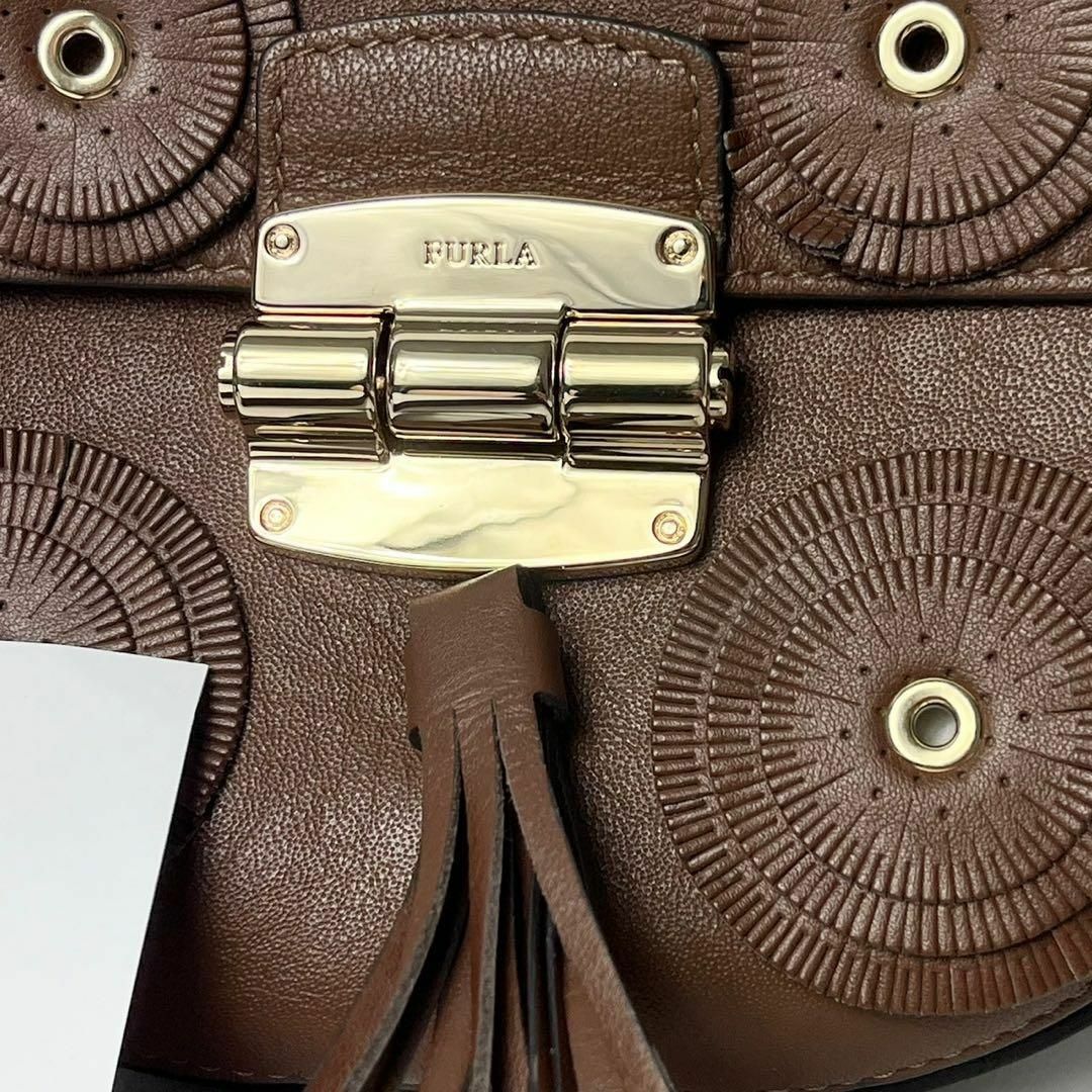 Furla(フルラ)の【美品】フルラ　クラブ　タッセル　ブラウン　ショルダーバッグ　パンチング レディースのバッグ(ショルダーバッグ)の商品写真