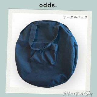 オッズ(odds)の美品》オッズ　odds.　T.N.B.U　黒　円形　ラウンドバック(トートバッグ)