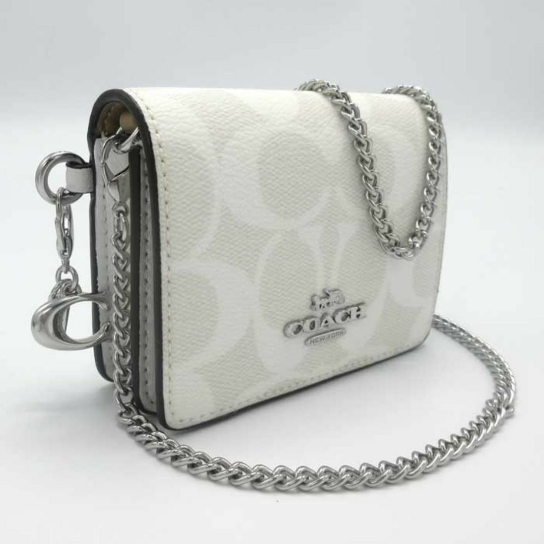 COACH(コーチ)の【新品】コーチ 財布 カードケース COACH シグネチャー チェーン ミニ ウォレット チャーム付き CN990 SVRFI (ホワイト系マルチ) アウトレット レディース Boxed Mini Wallet On A Chain In Signature Canvas レディースのファッション小物(財布)の商品写真