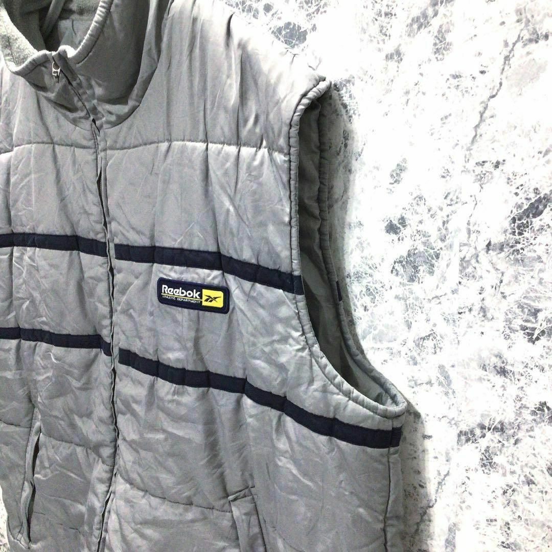 K215 イギリス古着リーボックワンポイントロゴボーダー中綿ジレベストビンテージ メンズのトップス(ベスト)の商品写真