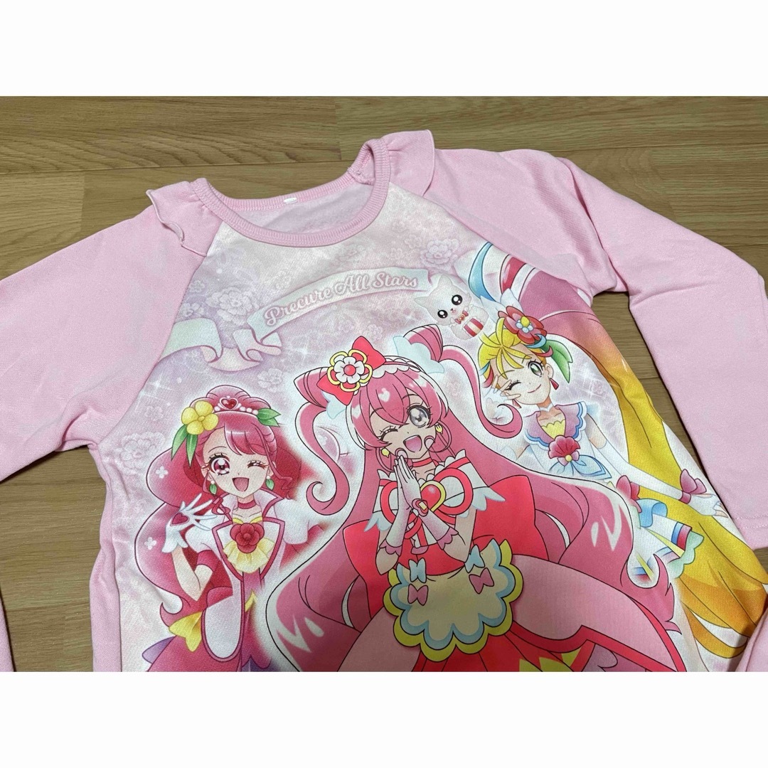 BANDAI(バンダイ)のプリキュアオールスターズ光る起毛パジャマ（カラー蓄光）ピンク　130センチ　長袖 キッズ/ベビー/マタニティのキッズ服女の子用(90cm~)(パジャマ)の商品写真