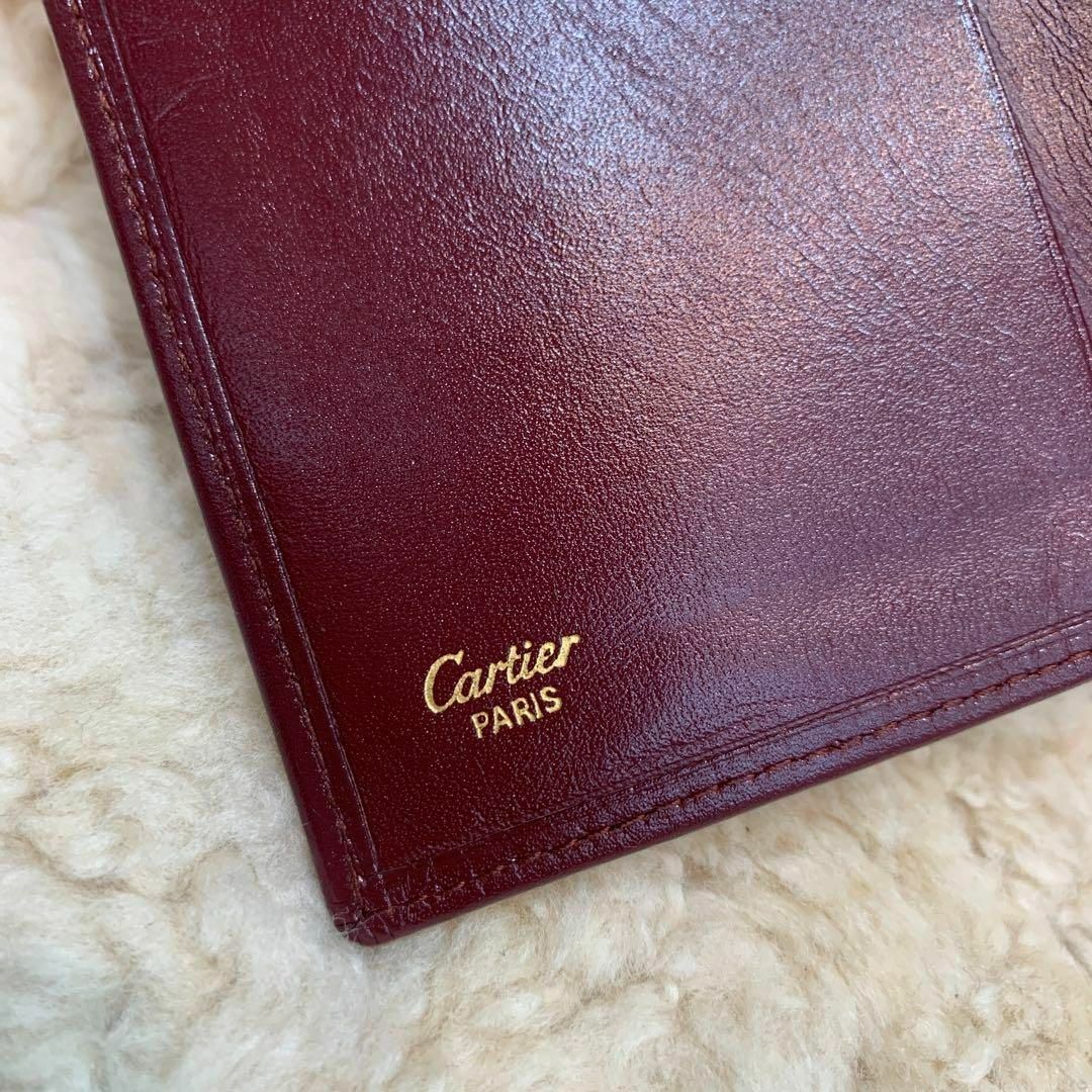 Cartier(カルティエ)のCartier マストライン 三つ折り長財布 ボルドー レディースのファッション小物(財布)の商品写真