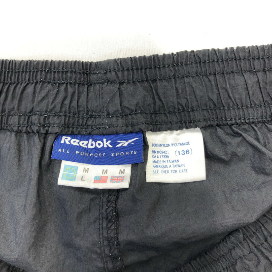 Reebok(リーボック)の90年代 Reebok リーボック ナイロンパンツ スポーツ ブラック (メンズ M) 中古 古着 Q6881 メンズのパンツ(その他)の商品写真