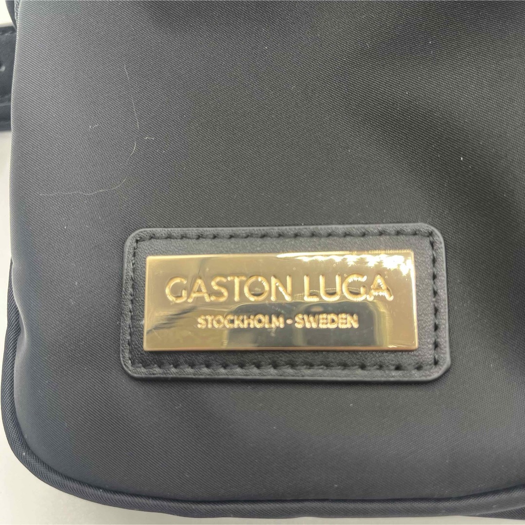 GastonLuga CLASSY(ガストンルーガクレッシー)の美品 ガストンルーガ リュック パーラン ナイロン 黒 巾着 フラップ プレート レディースのバッグ(リュック/バックパック)の商品写真