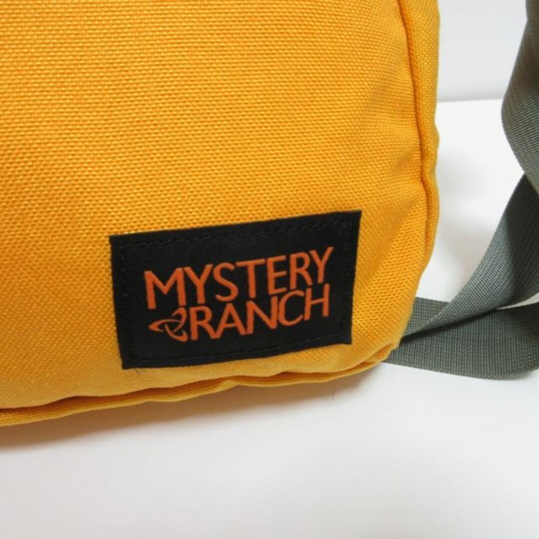 ミステリーランチ メッセンジャー ショルダーバッグ 斜め掛け 黄 STK メンズのバッグ(ショルダーバッグ)の商品写真
