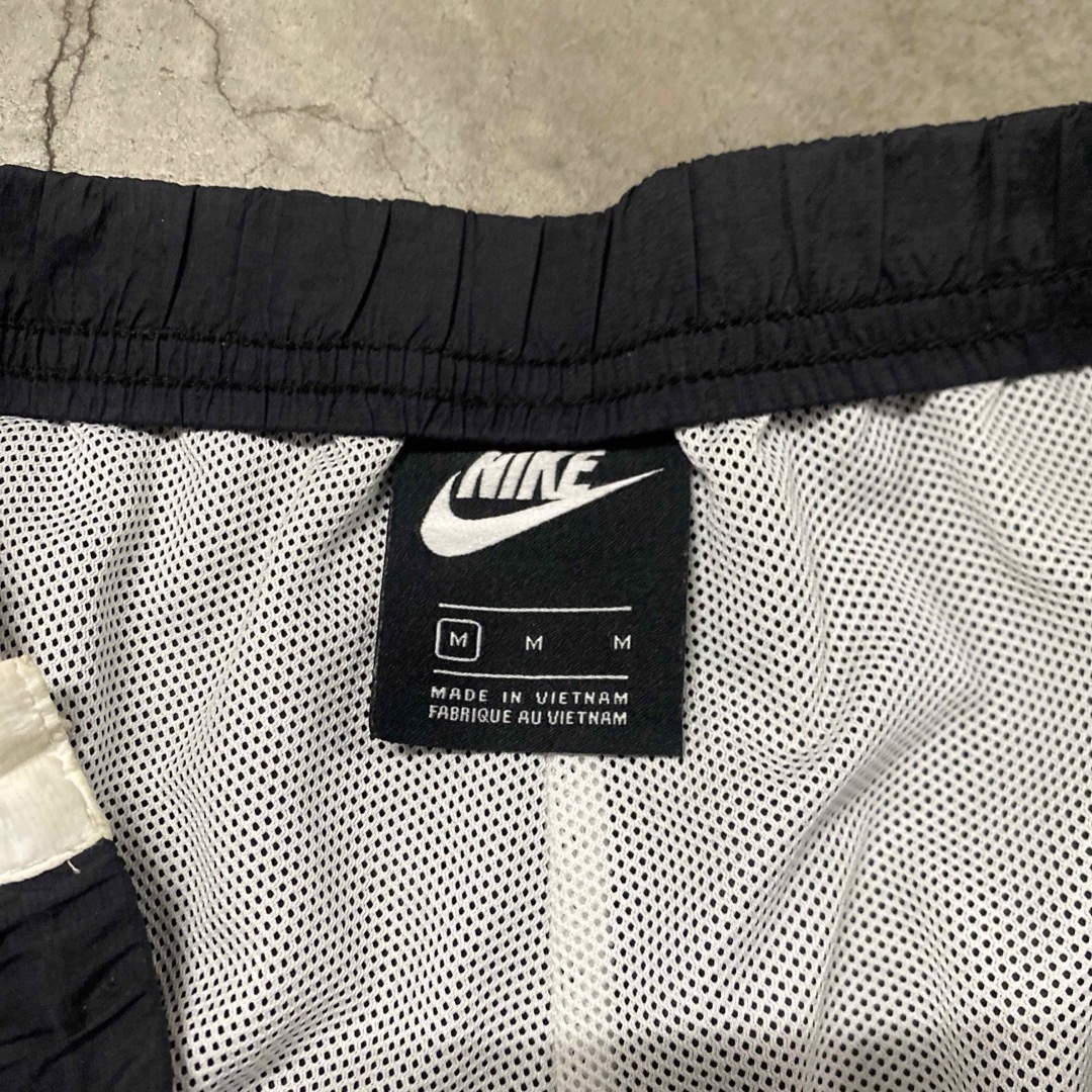 NIKE(ナイキ)のヴィンテージ vintage NIKE ナイキ スウッシュ ナイロンパンツ メンズのパンツ(その他)の商品写真