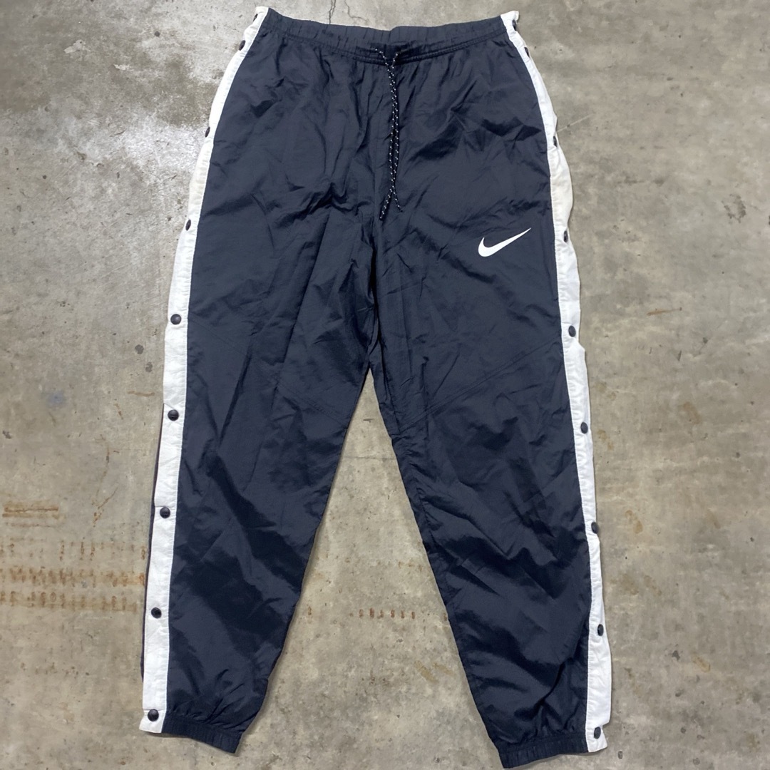 NIKE(ナイキ)のヴィンテージ vintage NIKE ナイキ スウッシュ ナイロンパンツ メンズのパンツ(その他)の商品写真