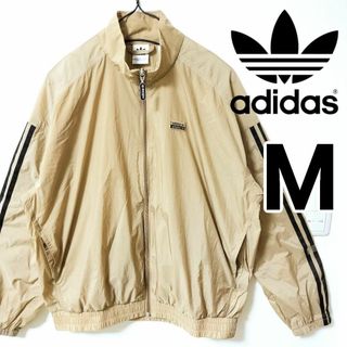 アディダス(adidas)のアディダス キャメル ナイロン トラックトップ ジャージ LiSA着用 女性Ｍ(ナイロンジャケット)