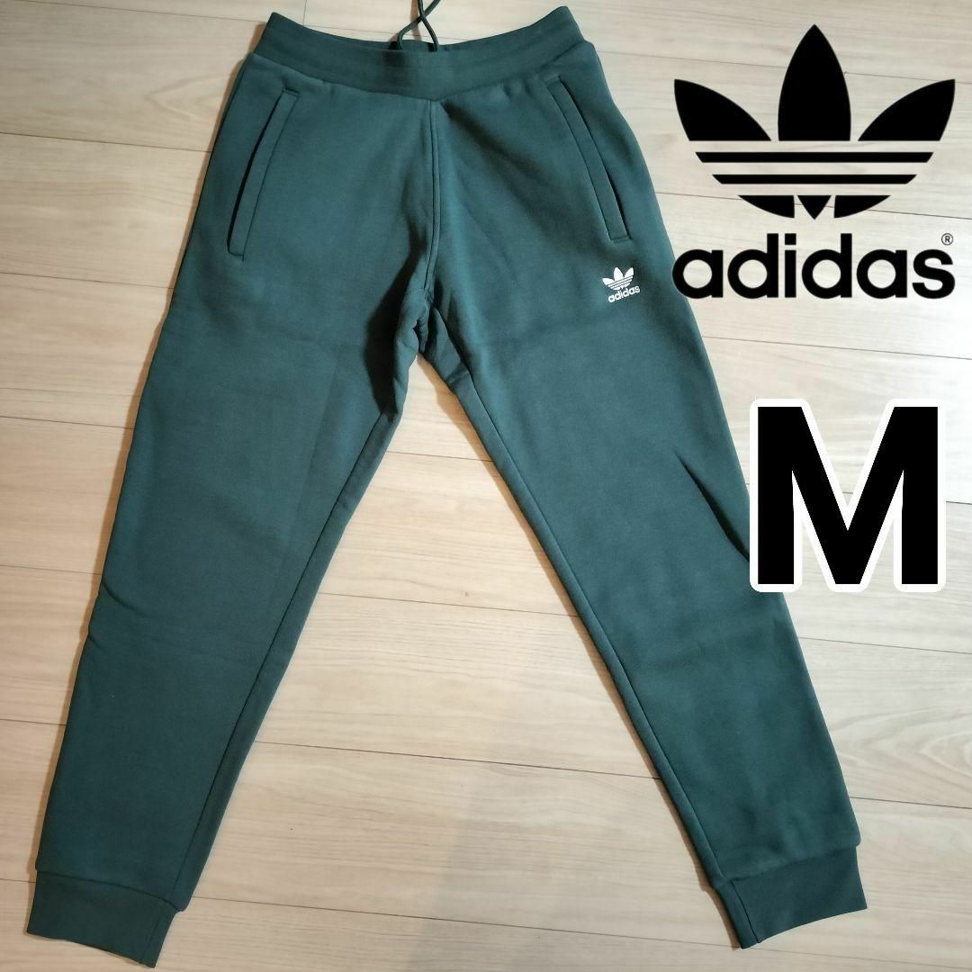 Originals（adidas）(オリジナルス)のadidas 濃緑 エッセンシャルズ スウェットパンツ ジャージ 男性M 裏起毛 メンズのパンツ(その他)の商品写真