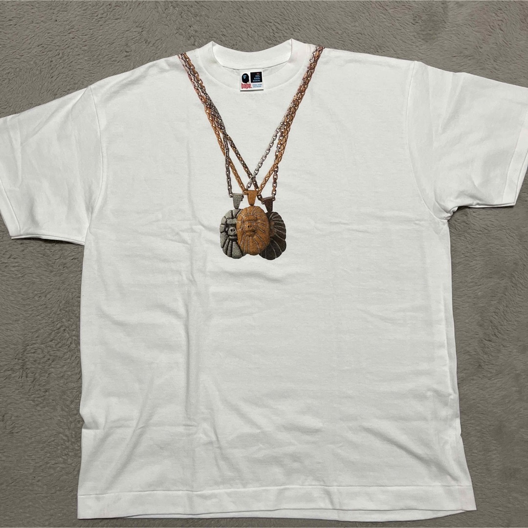 A BATHING APE(アベイシングエイプ)のAPE BAPE KAWS NFS限定　Jacob ネックレス　tシャツ　XL メンズのトップス(Tシャツ/カットソー(半袖/袖なし))の商品写真